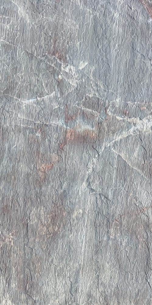 Dark slate flexible stone cladding on a hotel lobby wall
